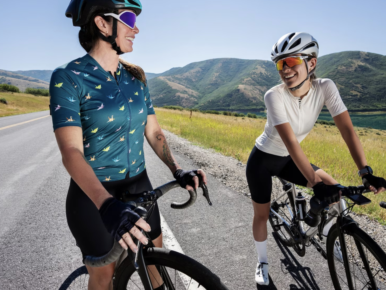 2 female road cyclists