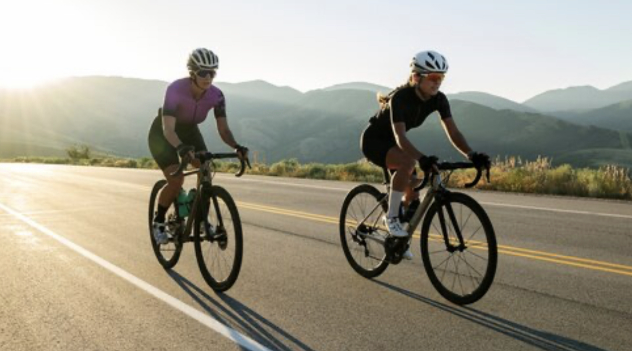 Women cycling road bikes